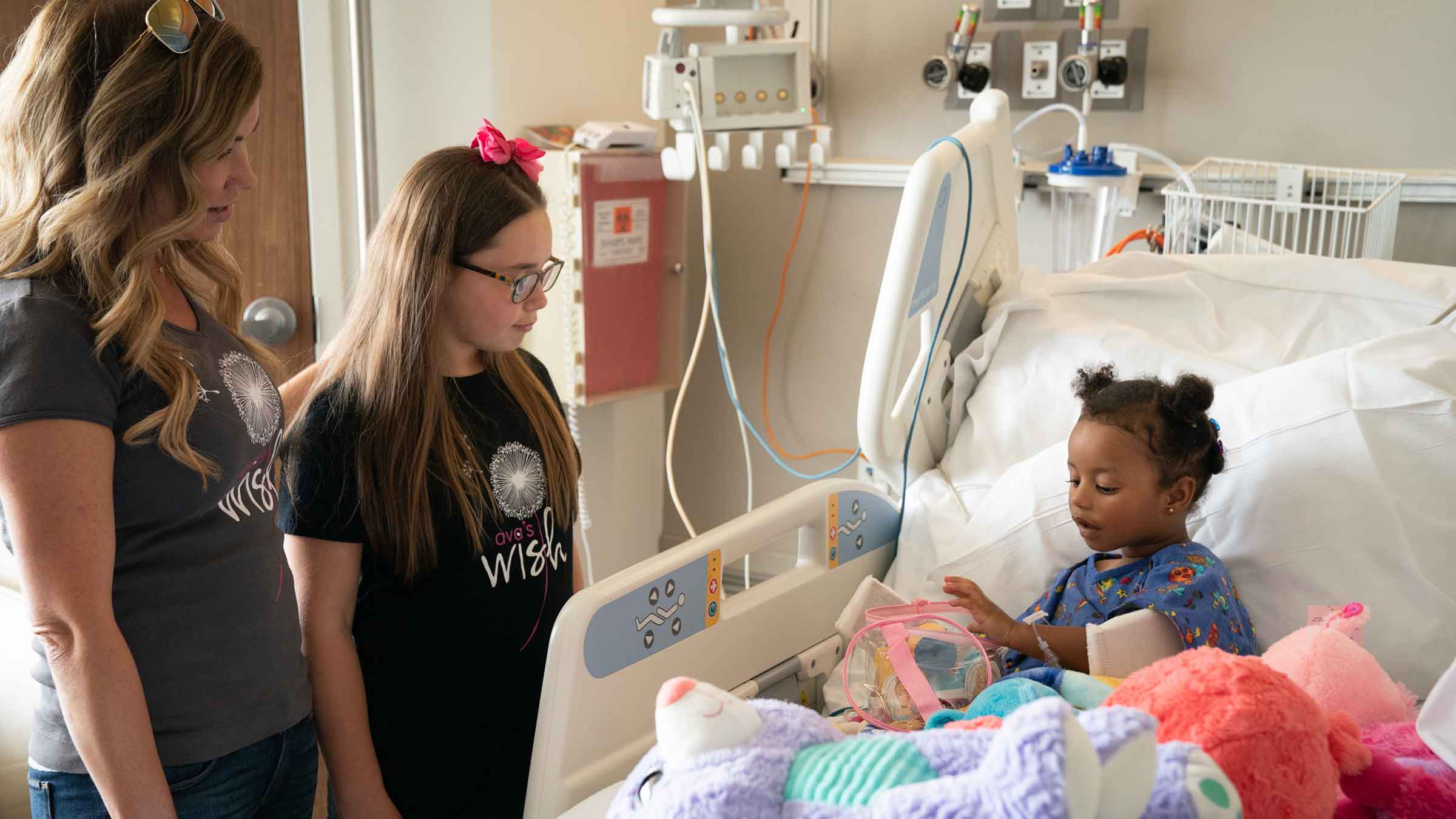 Ava Lopez at hospital speaking to patient