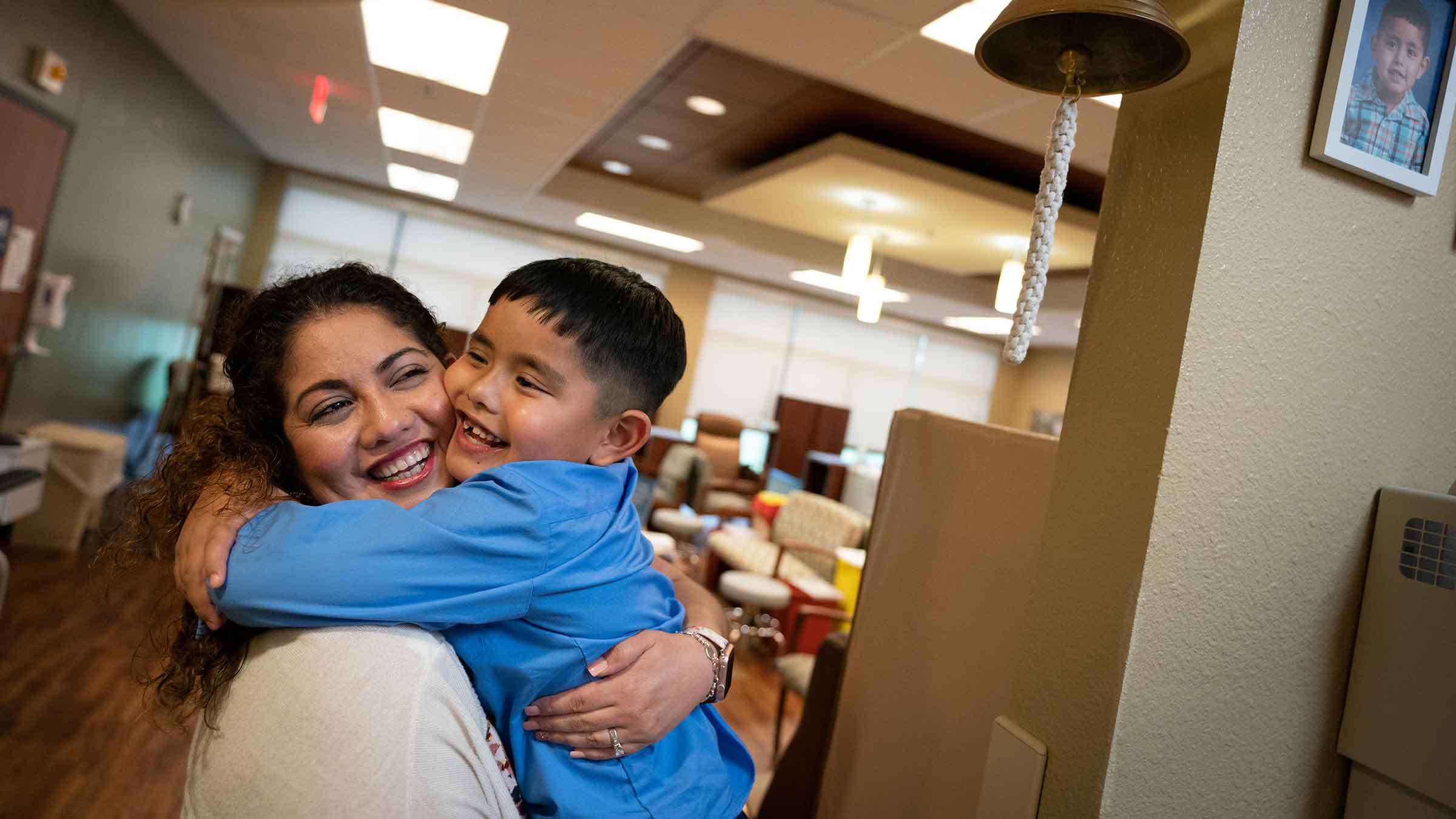 Mother and son hugging