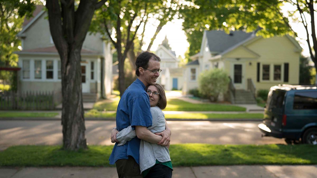 Man and woman embrace