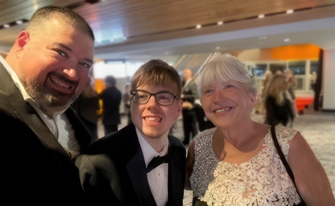 Mother and son attend gala.